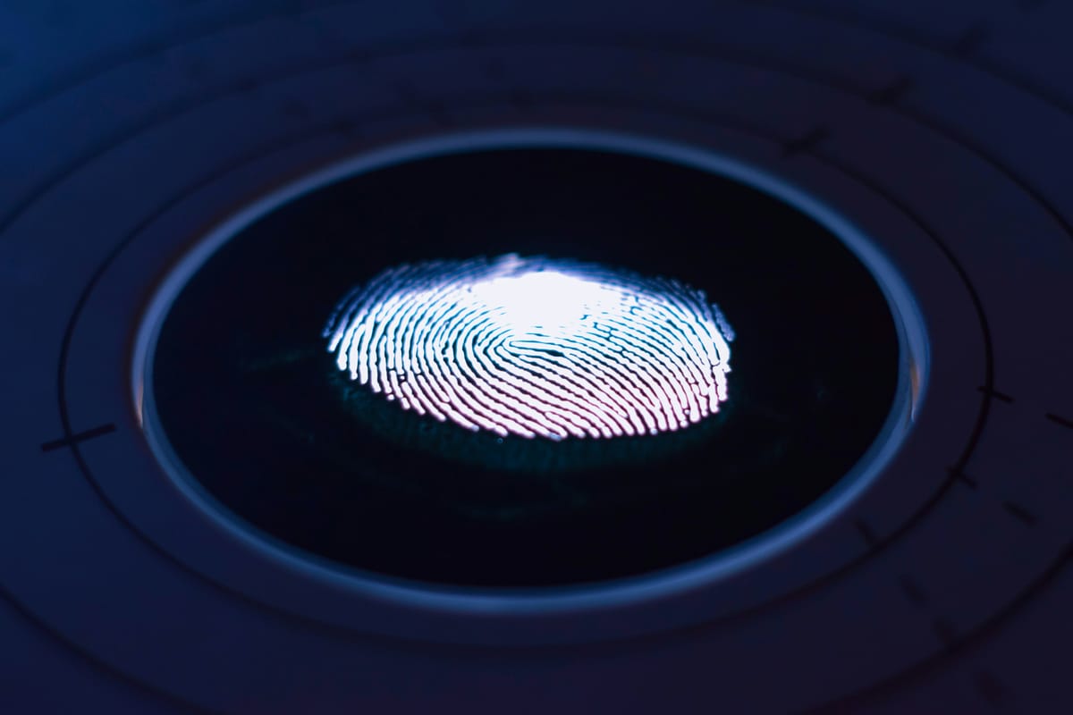 A thumbprint on a digital sensor. UK police have struggled with digital forensics.