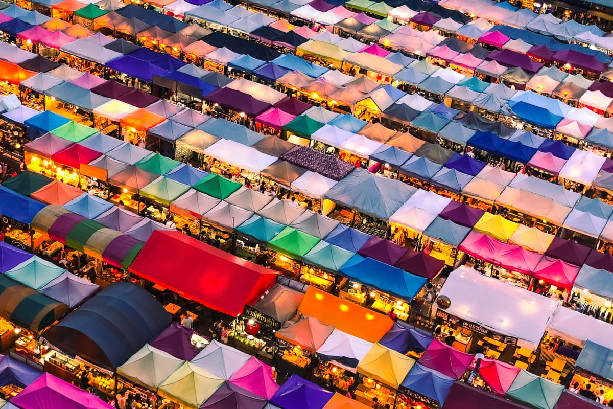 A busy market with hundreds of individual stalls seen from above. Lenovo is pushing into a busy enterprise AI market
