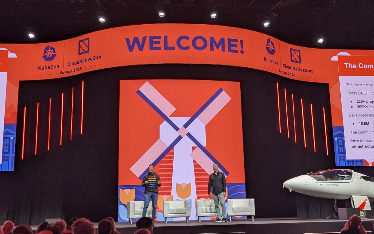 CNCF Executive Director Jonathan Bryce stands on stage at KubeCon Europe