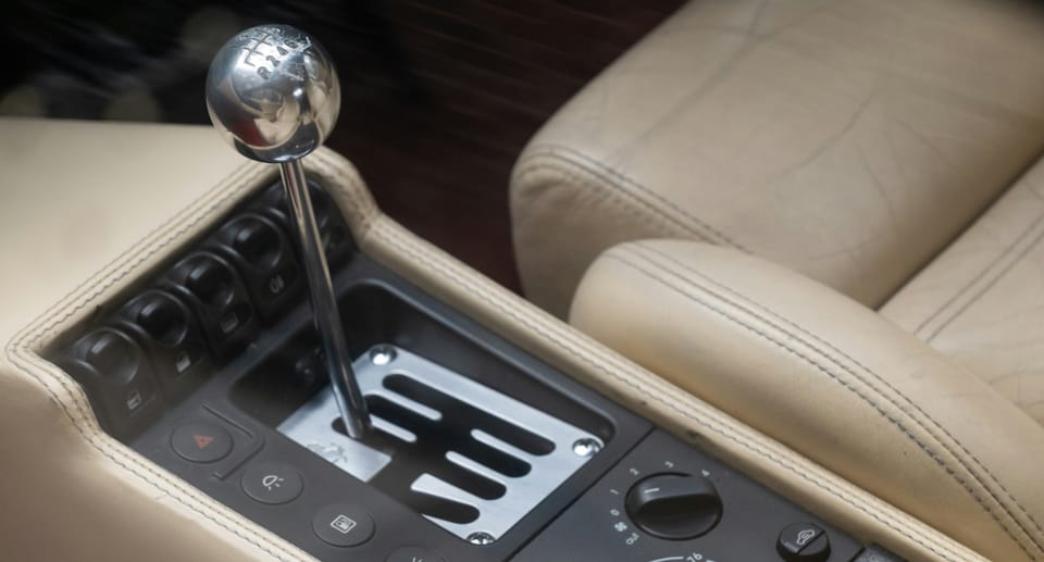 A car gear stick, representing the shift in IT spending called for by a government review