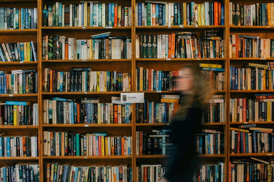 A person walks past a bookcase but they are blurry, AI hallucinations may be getting worse data shows