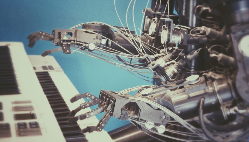 A robot plays a keyboard. AI-powered software could soon take on the work of human IT outsourcers.