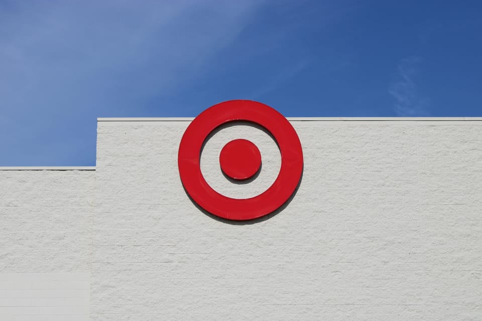 A Target logo on the side of a building. Target has purchased thousands of AI licenses to support its pursuit of efficient operations