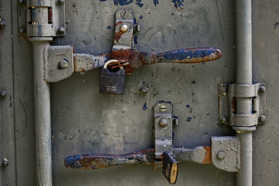 Two locks and safety latches covered in Rust. Android is using Rust for memory safety gains.