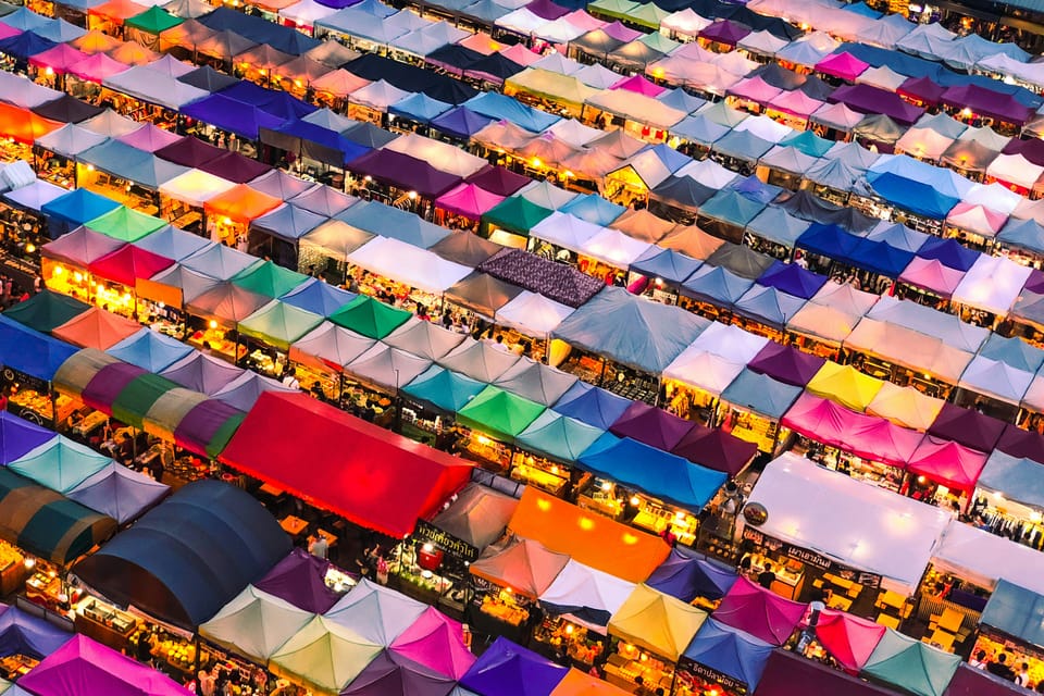 A busy market with hundreds of individual stalls seen from above. Lenovo is pushing into a busy enterprise AI market